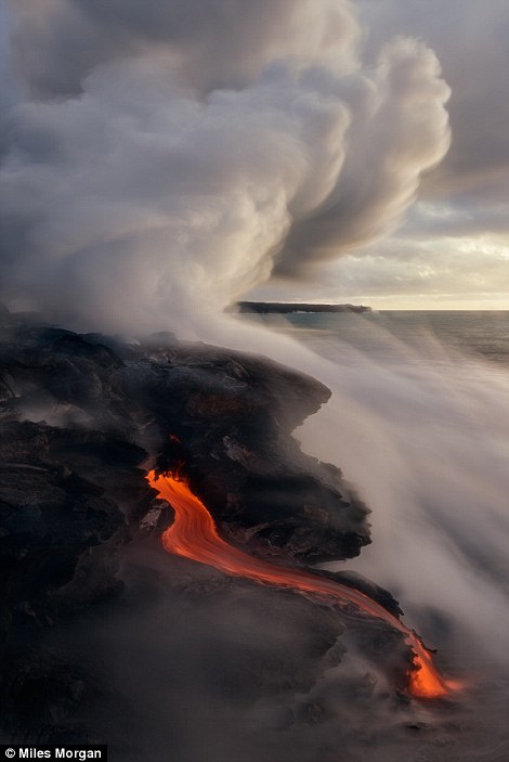 A huge rive of lava from the Kilauea enters the ocean right where myself, Bruce Omori and Tom Kuali?i of Extreme Exposure Photography, and Ryan Dyar had been standing 5 minutes before 