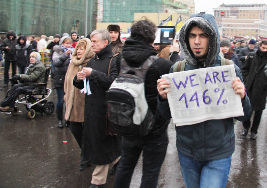 Плакаты митингующих на Болотной площади в Москве 10 декабря 2011 года. © Maksim Grevtsov