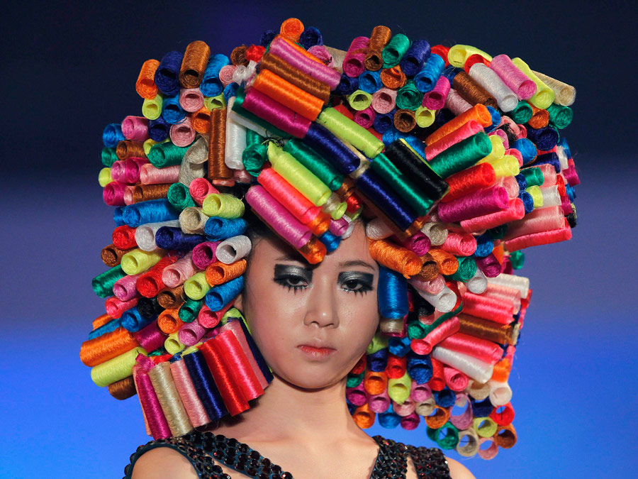 Модельный показ на шоу «Коллекция причесок в Корее - 2012» в Сеуле. © Jo Yong-Hak/Reuters