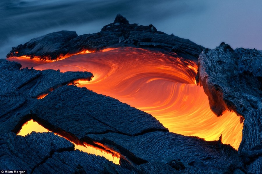 Red river: A massive river of lava flowing into the ocean from the Kilauea Volcano shortly before dawn