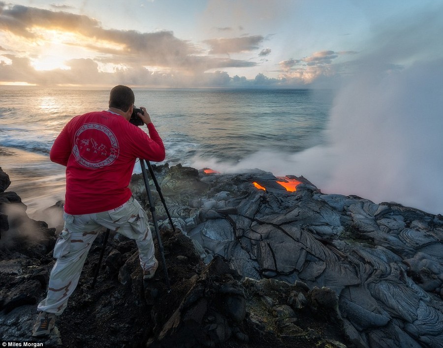 Risky business: Photographers like Morgan who specialize in volcanoes are at risk of falling into the scorching 1,110-degree flow or boiling water 