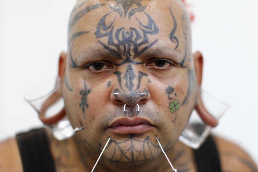 Участник выставки Expo Tattoo 2012 Venezuela в Каракасе. © Jorge Silva/Reuters