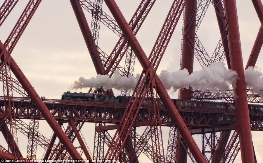 Steam and iron: This photograph, called Caught in a Web of Iron, was taken in North Queensferry, Fife by David Cation and won the Network Rail 'Lines in the Landscape' award 