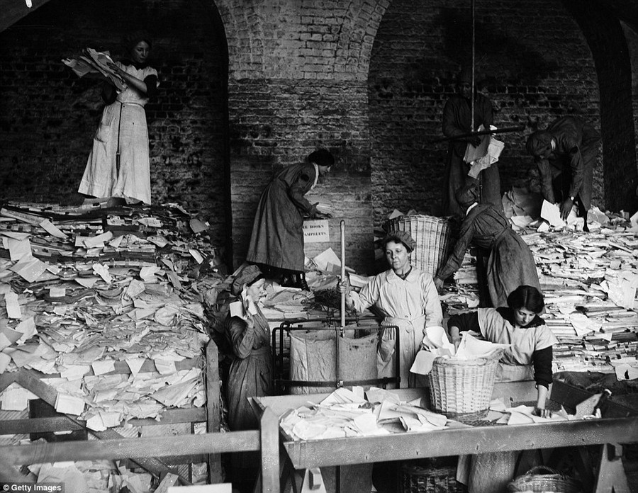 Waste paper: The paper, as this photo taken on the 16th April 1917 shows, then had to be sorted into piles and stored 